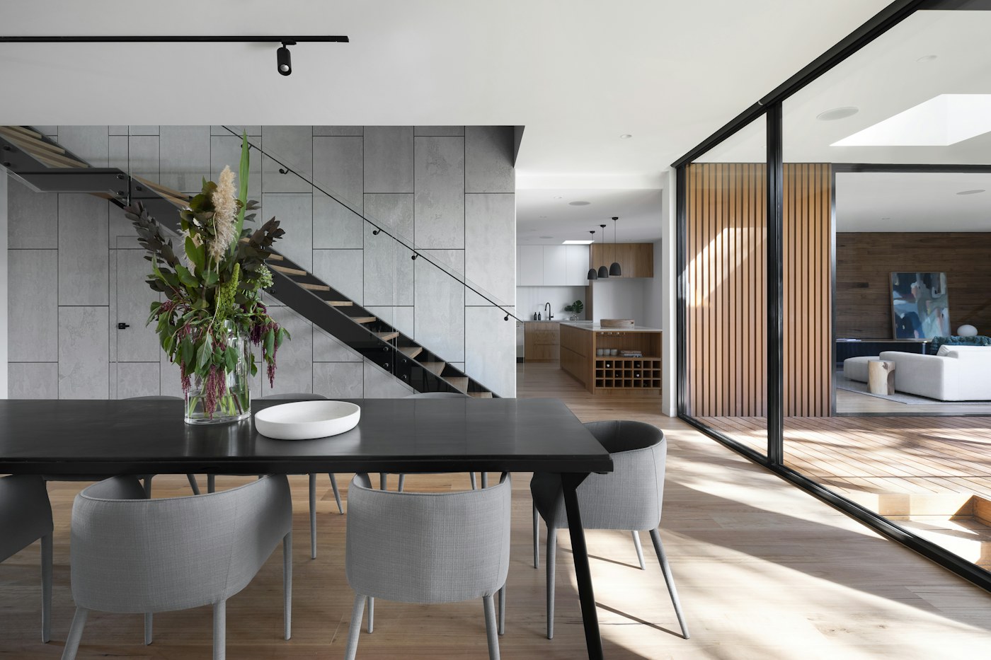 An interior composed with daylight and natural materials